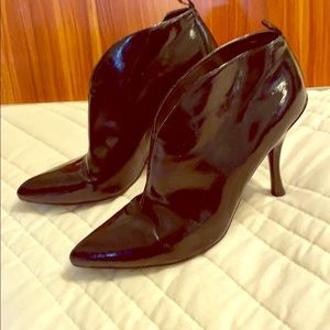 Sassy patent leather- like ankle bootie.